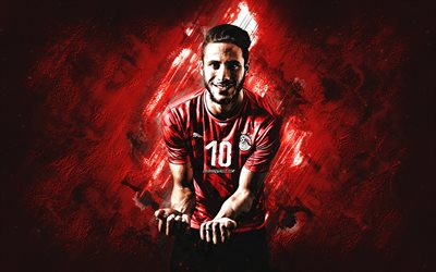 ramadan sobhi, squadra di calcio nazionale in egitto, ritratto, calciatore egiziano, background di pietra rossa, calcio, egitto