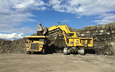 Komatsu 730E-8, mining dump truck, mining excavator, Komatsu PC 550G, quarry work, stone mining, dump truck loading, excavator, stone sale, construction machinery, Komatsu